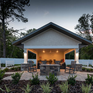 Covered community pavilion with fire pit